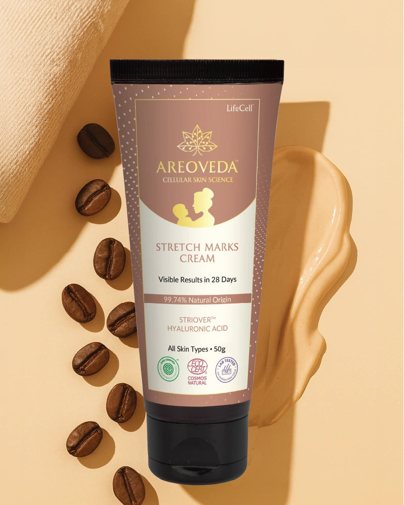 AreoVeda stretch marks cream tube with coffee beans on a beige background