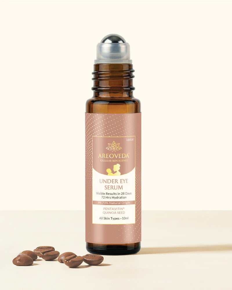AreoVeda under eye serum bottle with coffee beans on a beige background